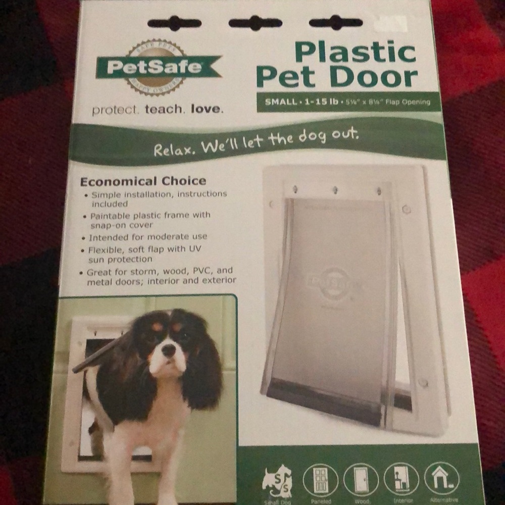 Plastic pet door . Small 1-15 lbs .